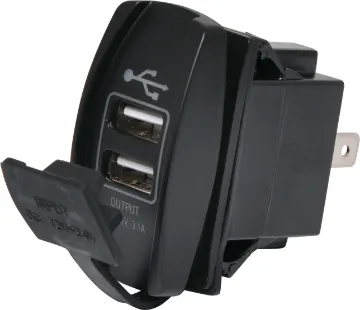 Dual USB Dash Mount 3.1A Charging Socket Connects directly to 12-24V with i6.8mm spade terminals. Fitted with rubber cap to prevent moisture and dust ingress. Designed to mount directly in a modern dashboard blanking panel.
