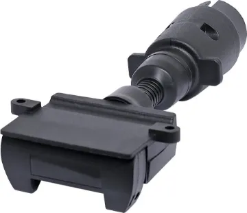 Large 7 Pin Round Plug To 7 Pin Flat Socket Adapter 7 pin round to 7 pin flat trailer adapter.  Allows you to connect a trailer with a 7 pin flat connector to a vehicle with large round 7 pin connector.