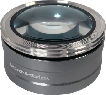 5x-7x Adjustable Handheld LED Magnifier This illuminated surface magnifying loupe offers 5x -7x magnification through its 72mm lens.