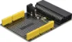 Features an adhesive breadboard, plus matching solder masked PCB holes underneath for when you want to solder down your design. All micro:bit pins broken out to headers. 